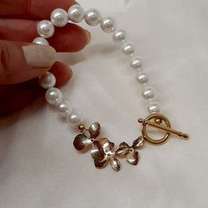 Clara - natural freshwater pearls or crystal based pearls and orchid shaped links bracelet with toggle clasp