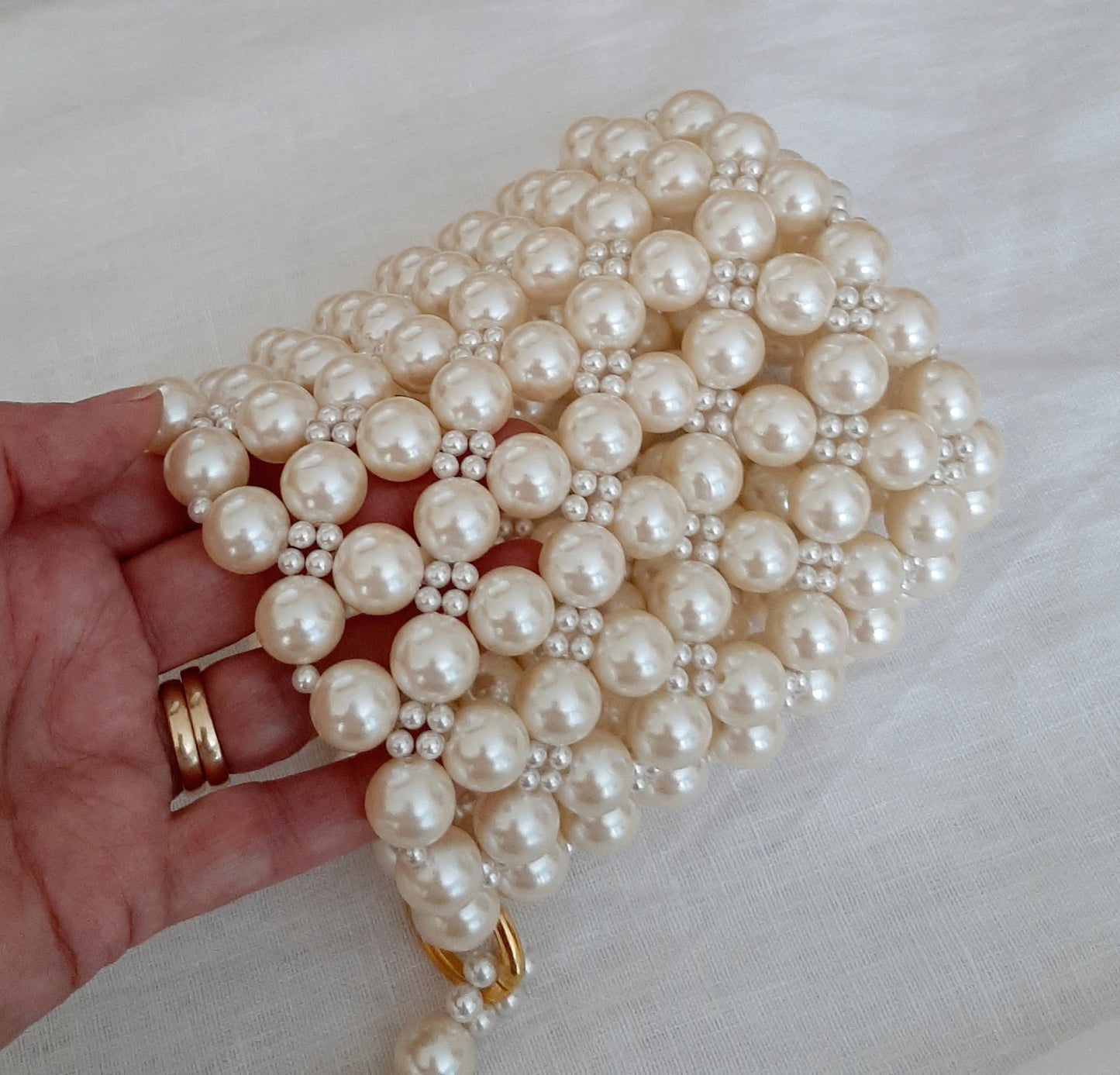 Bianca - lustrous pearls bucket bag with satin drawstring inner