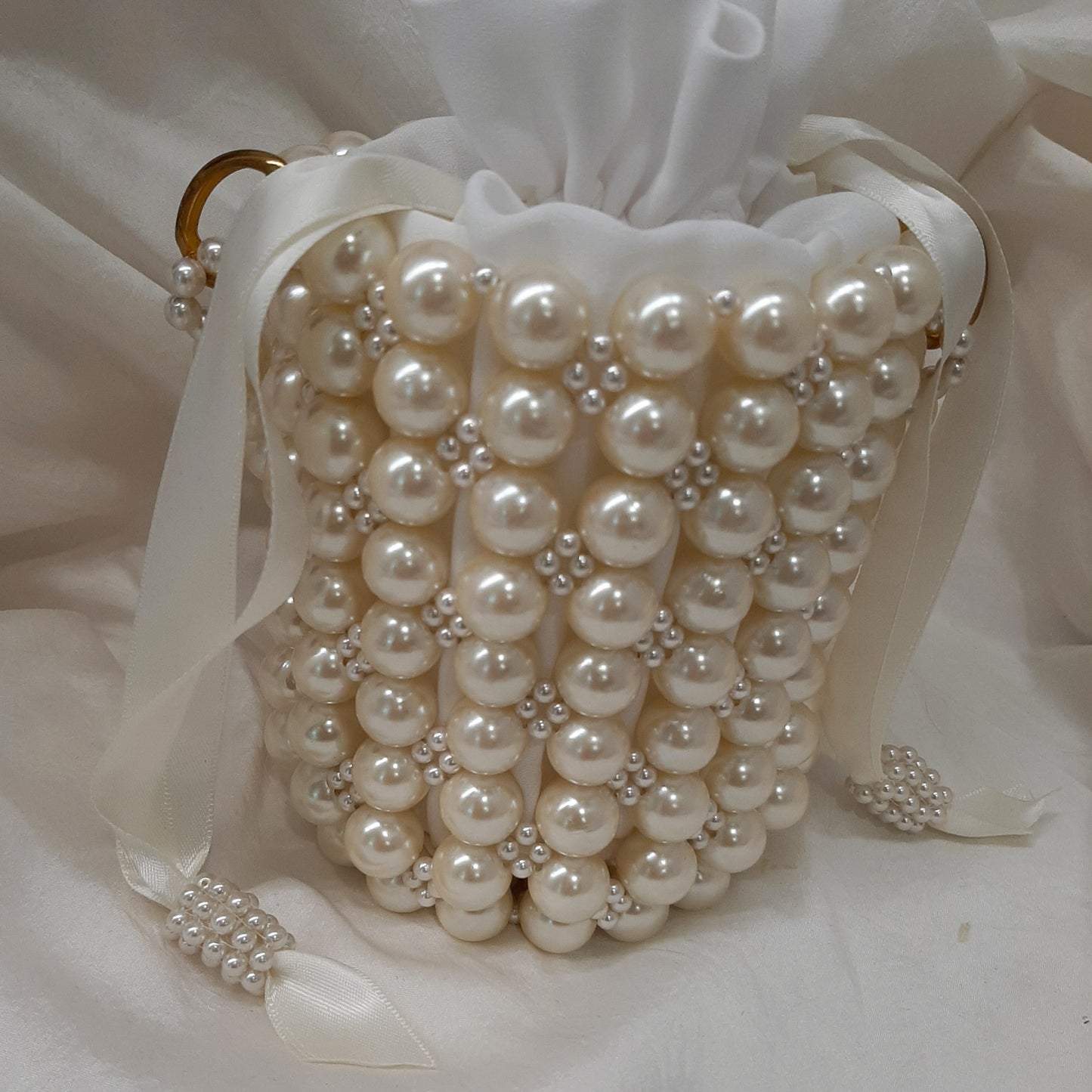 Bianca - lustrous pearls bucket bag with satin drawstring inner