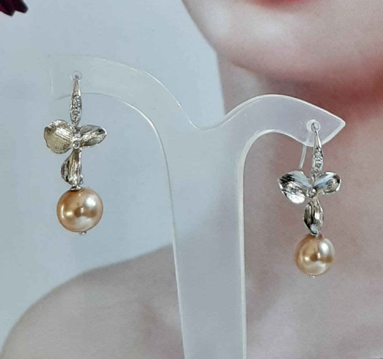 Rachel - faux pearl and small shiny silver-tone orchid shaped flower drop earrings