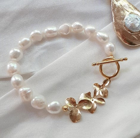 Clara - natural freshwater pearls or crystal based pearls and orchid shaped links bracelet with toggle clasp