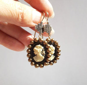 Cameo antiqued brass pearls and cross drop earrings