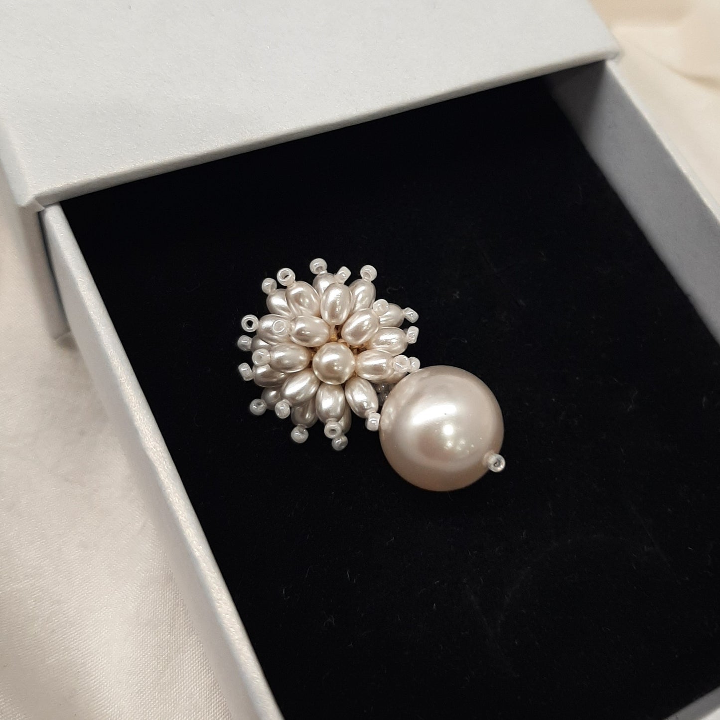 Dora - crystal pearl flower shaped stud and round pearl drop earrings