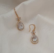 Load image into Gallery viewer, Eve - Cubic Zirconia crystal clear pear shaped drop and bow earrings