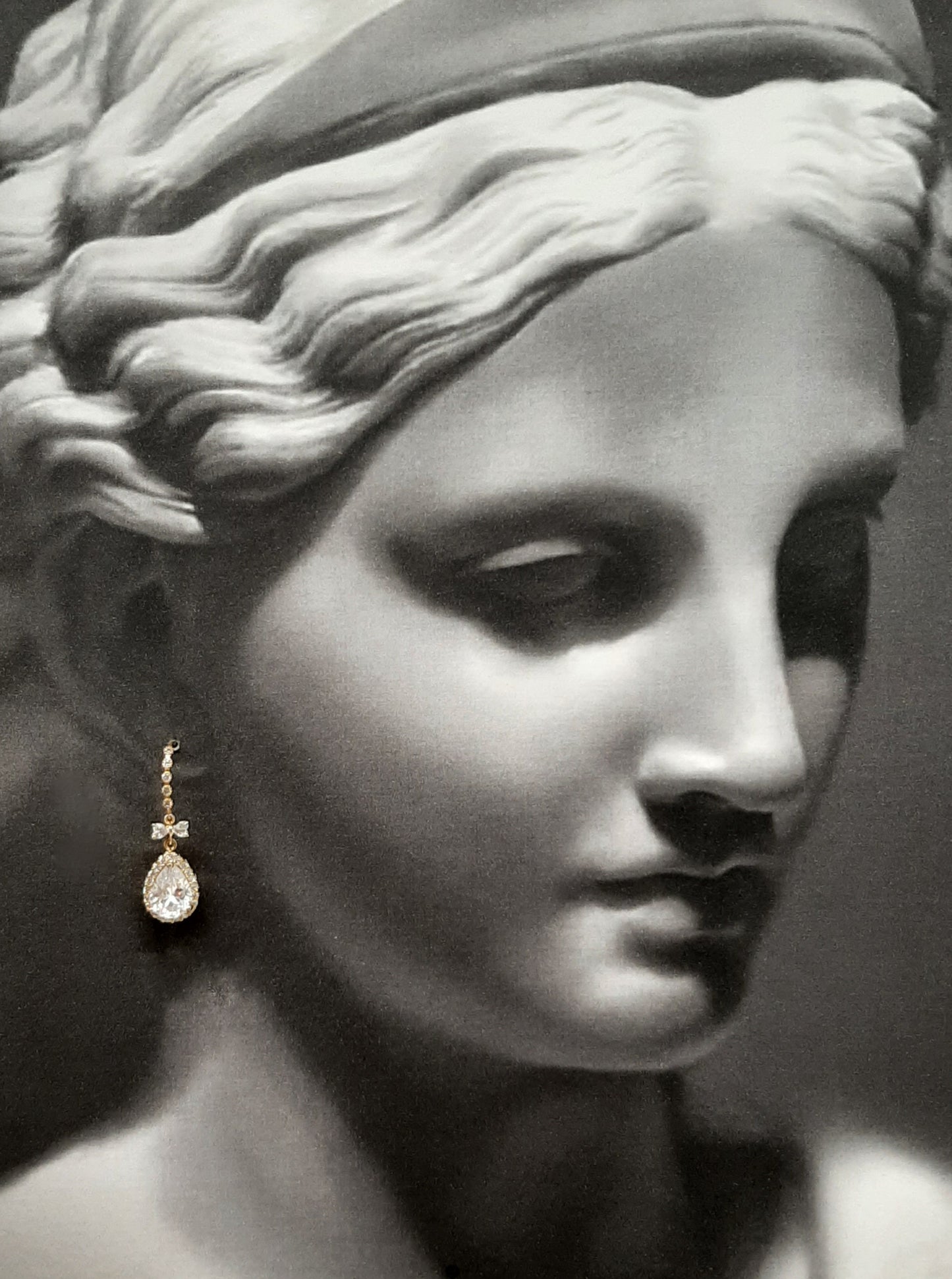 Eve - Cubic Zirconia crystal clear pear shaped drop and bow earrings