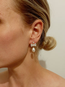 Hazel - Swarovski crystal pearl drop and cubic zirconia bow gold-tone stud earrings