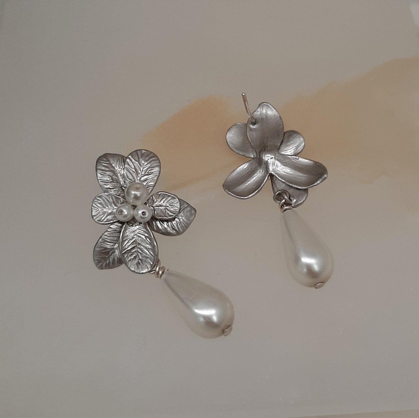 Marcy - faux pearl drop and silver-tone seven petal flower stud earrings