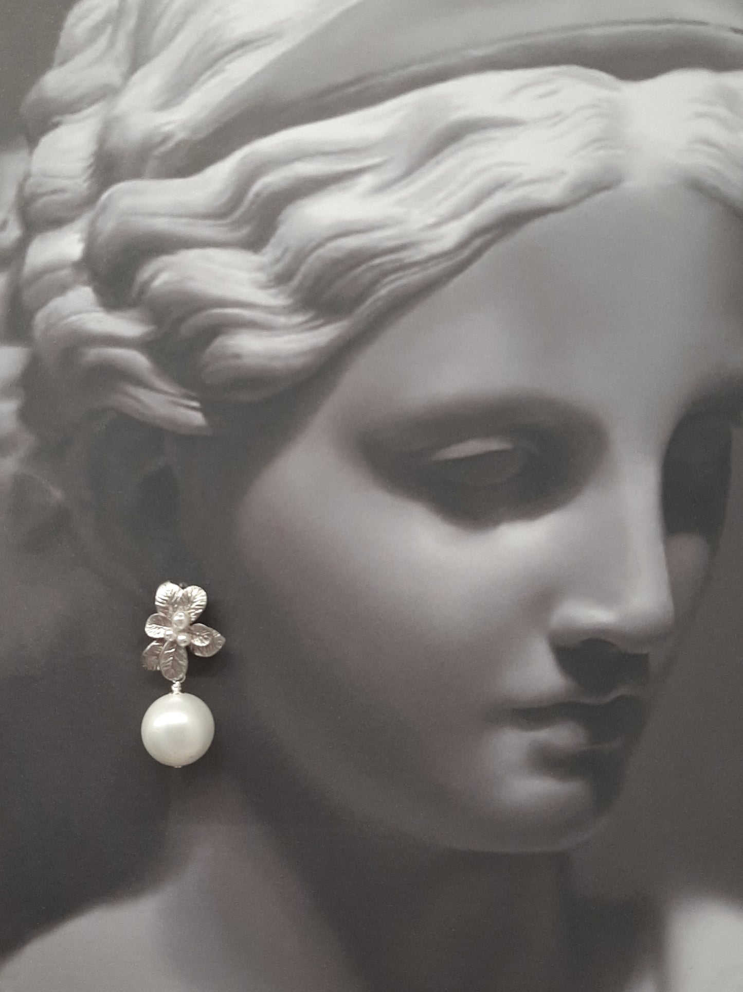 Marcy - faux pearl drop and silver-tone seven petal flower stud earrings