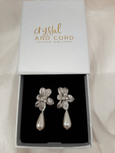 Marcy - faux pearl drop and silver-tone seven petal flower stud earrings