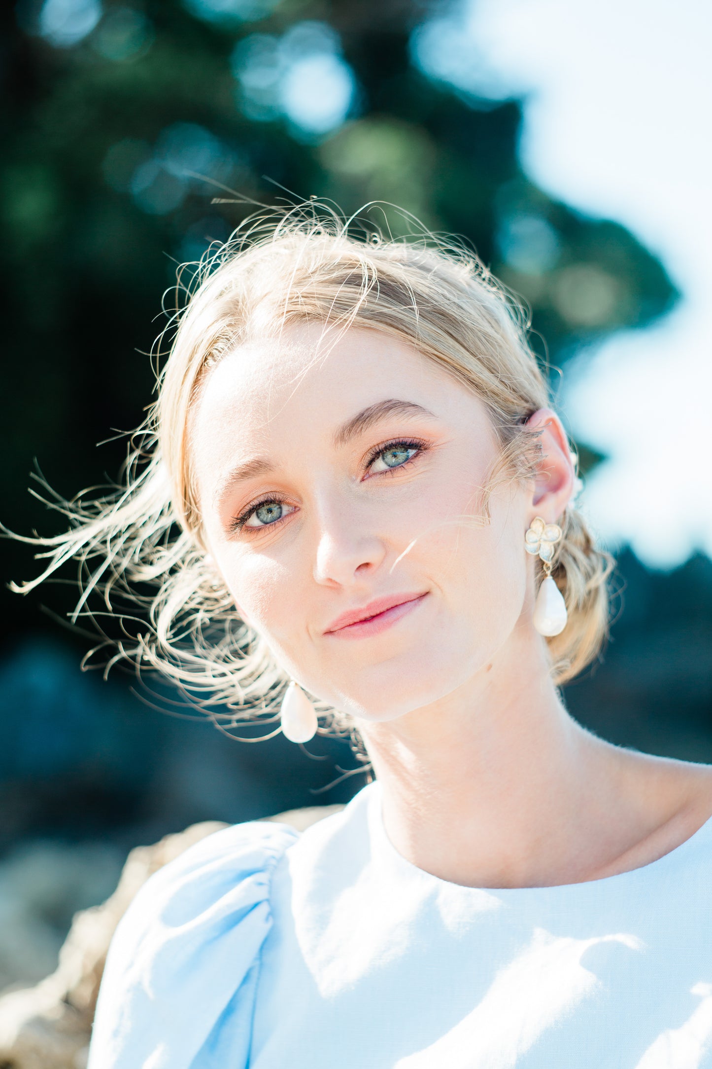 Monica - faux pearl drop and gold tone five petal flower stud earrings