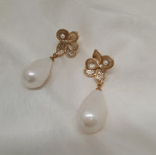Load image into Gallery viewer, Monica - faux pearl drop and gold tone five petal flower stud earrings
