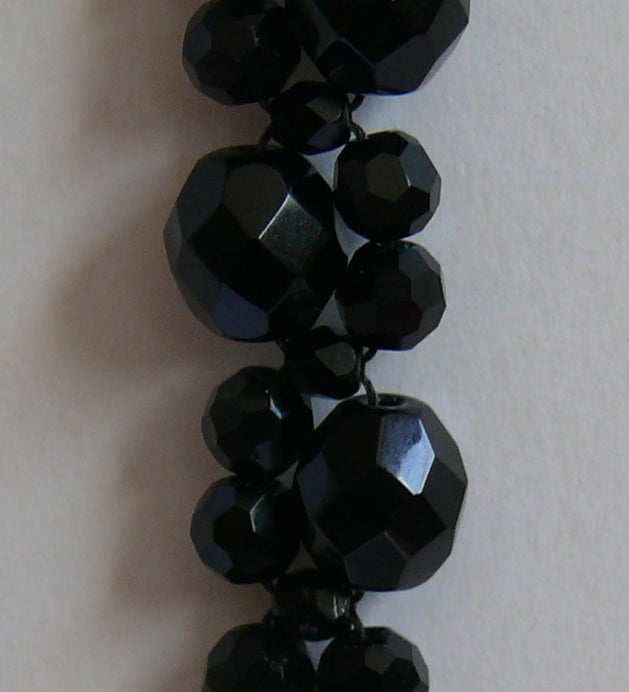 Black long cascading beaded statement stud earrings