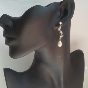 Isabelle - pear shaped pearl and sterling silver vine drop earrings and bracelet