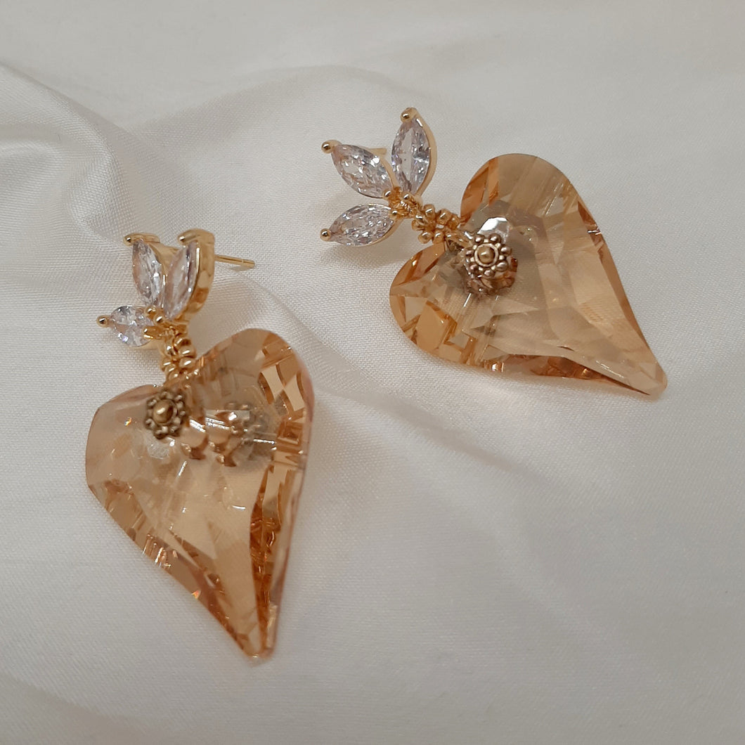 Victoria - golden shadow crystal heart suspended from cubic zirconia gold-tone earstuds