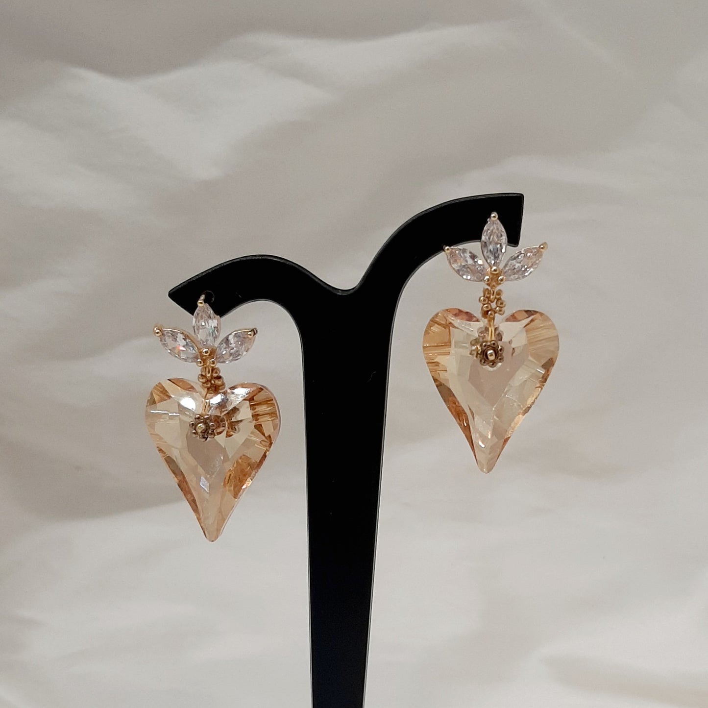 Victoria - golden shadow crystal heart suspended from cubic zirconia gold-tone earstuds