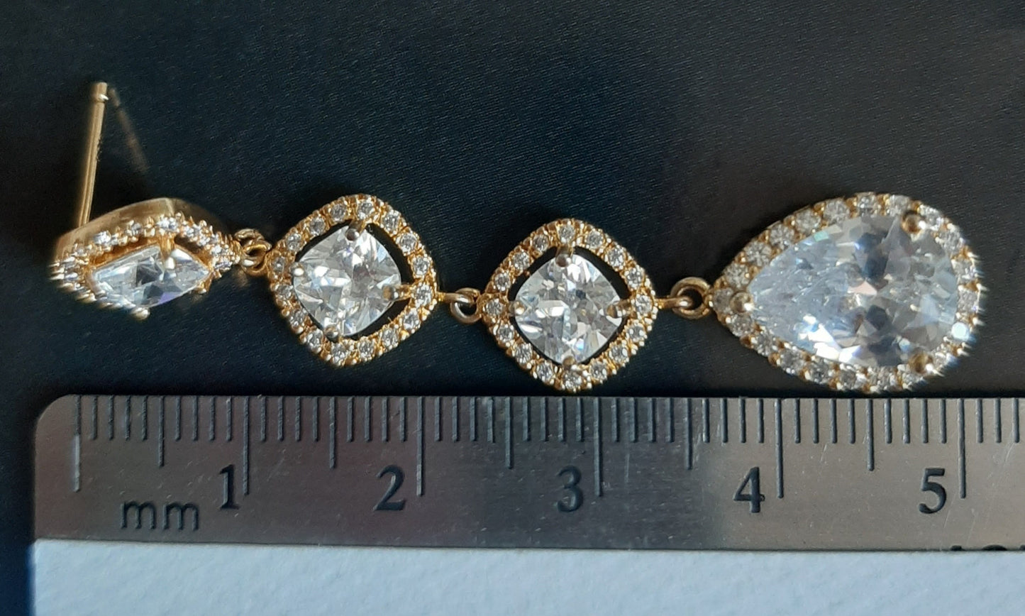 Cubic zirconia cushion and tear drop stud earrings